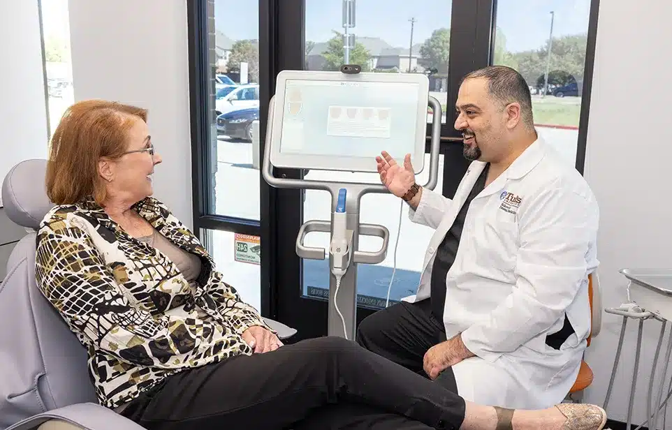 Dr. Fadi White With Patient - Allen Dental Lounge